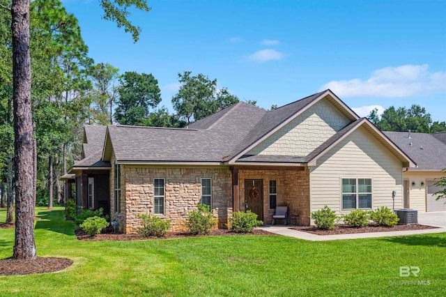 view of front facade with a garage and a front yard