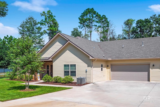 view of front facade featuring a garage and a front lawn