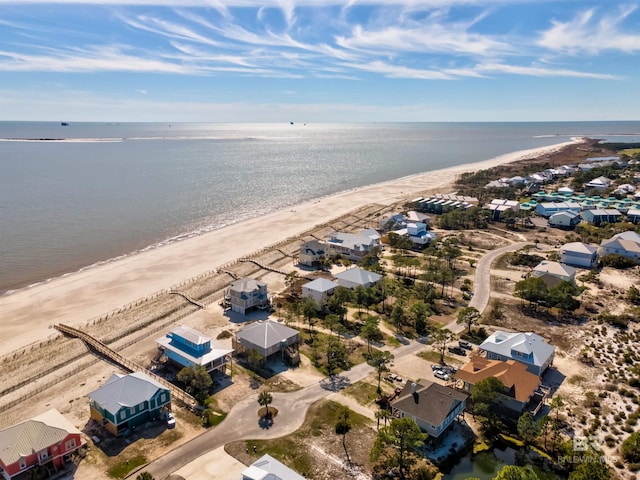 aerial view with a beach view and a water view