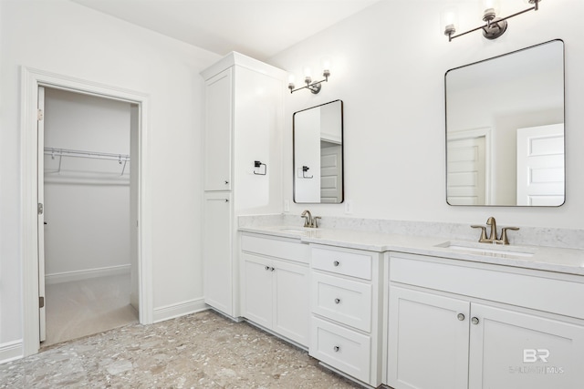 5099 Leeward Dr, Pensacola, FL 32507 - full bath featuring double vanity and a walk in closet
