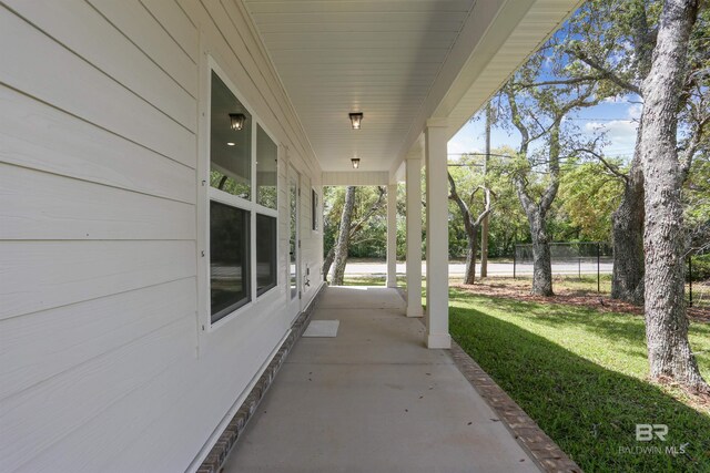 5099 Leeward Dr, Pensacola, FL 32507 - view of patio featuring a porch