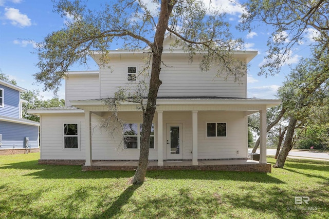 5099 Leeward Dr, Pensacola, FL 32507 - rear view of property with a porch and a yard