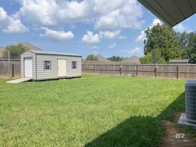 view of yard with cooling unit and a storage unit