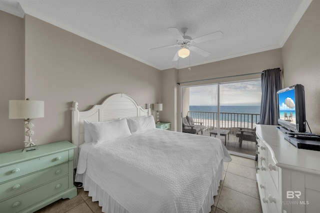 bedroom with a textured ceiling, ornamental molding, a ceiling fan, and access to outside