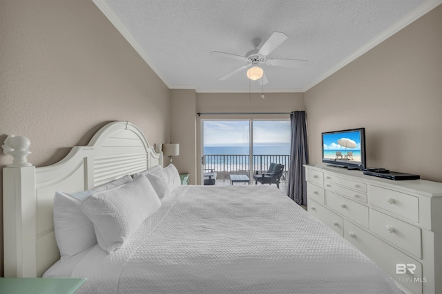 bedroom featuring ceiling fan, a textured ceiling, access to exterior, and ornamental molding