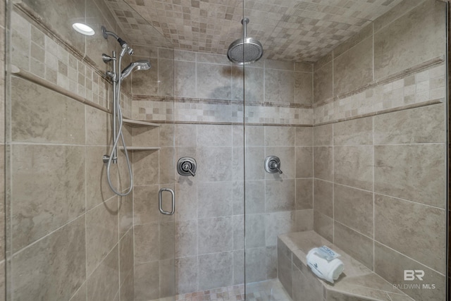 full bathroom featuring a stall shower