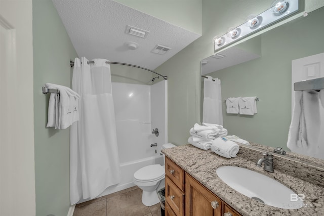 full bathroom with tile patterned floors, visible vents, toilet, a textured ceiling, and vanity