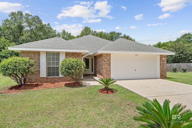 16063 Mansion St, Foley, AL 36535 - ranch-style house with an attached garage, brick siding, concrete driveway, and roof with shingles