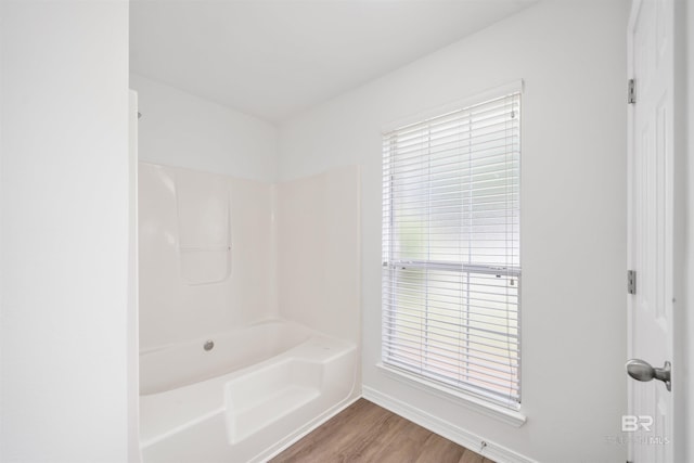 16063 Mansion St, Foley, AL 36535 - bathroom with wood finished floors, baseboards, and  shower combination