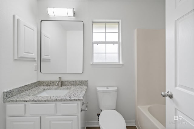 16063 Mansion St, Foley, AL 36535 - bathroom with vanity, toilet, and baseboards