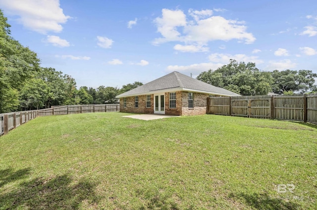 16063 Mansion St, Foley, AL 36535 - view of yard with french doors and a patio area