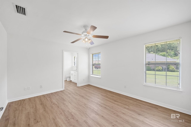 16063 Mansion St, Foley, AL 36535 - unfurnished room with light wood-type flooring, ceiling fan, and baseboards
