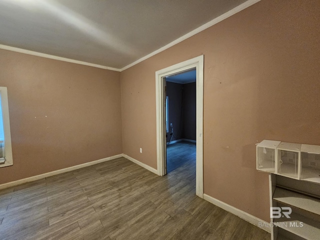 31398 Brady Rd, Robertsdale, AL 36567 - empty room featuring baseboards, wood finished floors, and crown molding