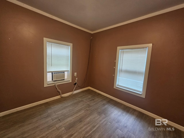31398 Brady Rd, Robertsdale, AL 36567 - spare room with cooling unit, crown molding, baseboards, and wood finished floors