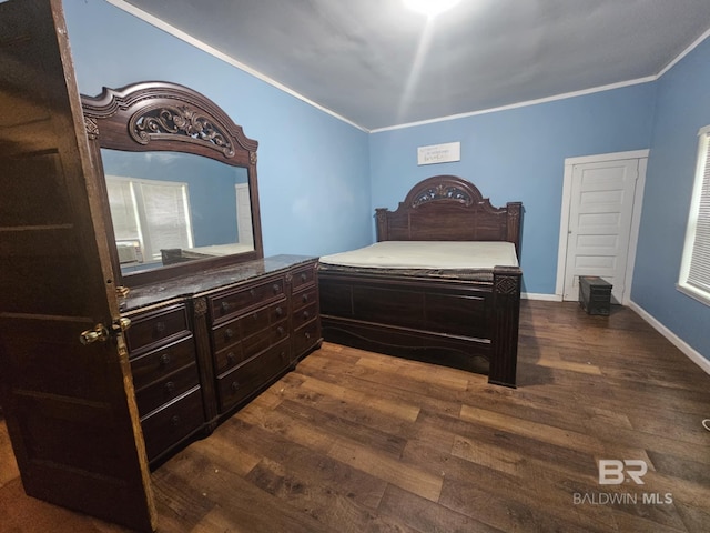 31398 Brady Rd, Robertsdale, AL 36567 - bedroom with baseboards, dark wood-style flooring, and crown molding