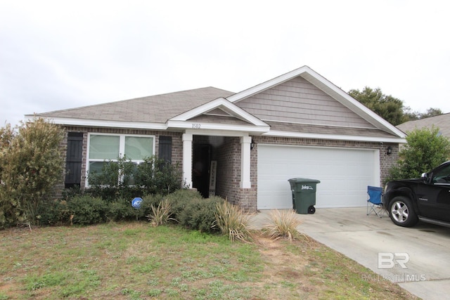 view of front of home with a garage and a front lawn