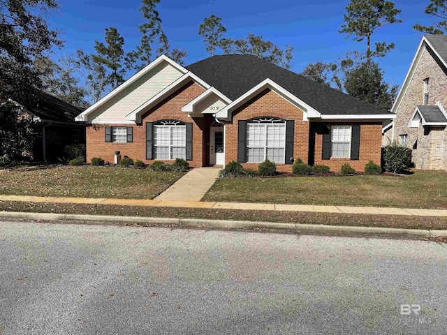 view of front of property with a front lawn