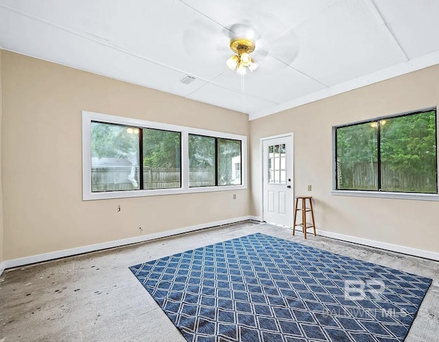 unfurnished room with ceiling fan