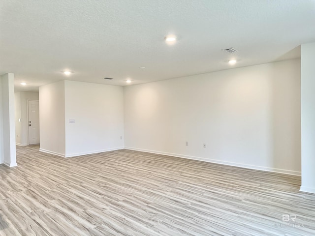 1036 Hayward Loop, Foley, AL 36535 - empty room featuring recessed lighting, baseboards, and light wood-style flooring
