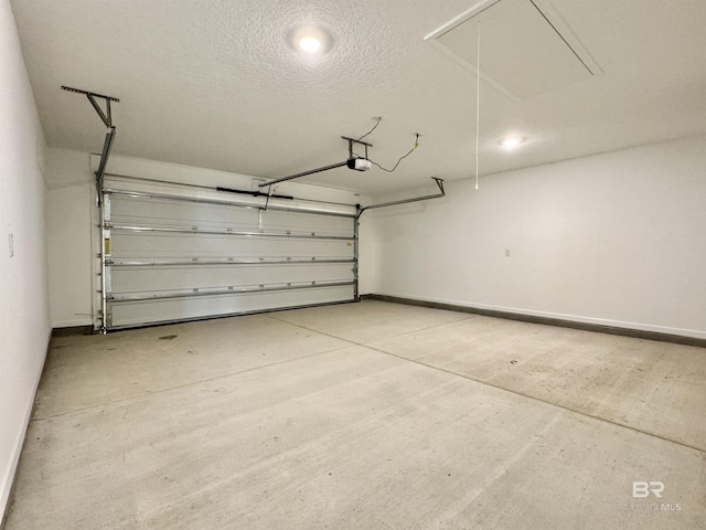 1036 Hayward Loop, Foley, AL 36535 - garage with a garage door opener and baseboards