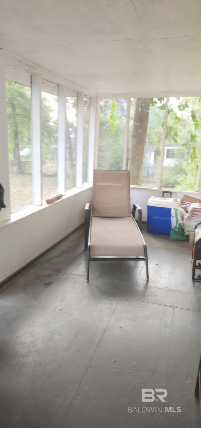 sunroom / solarium featuring a wealth of natural light