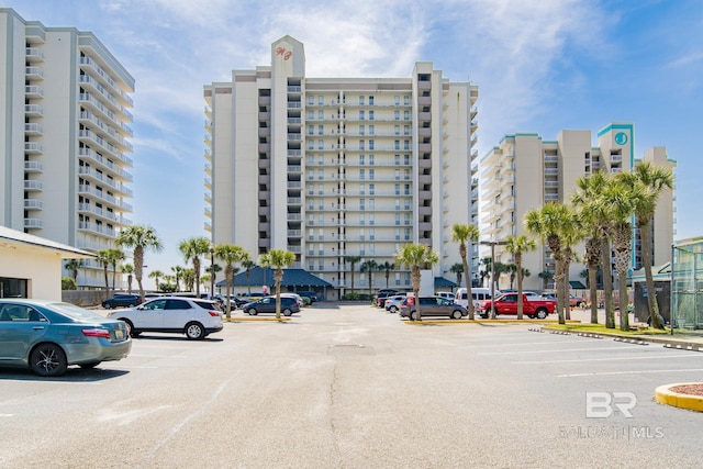 view of property with uncovered parking