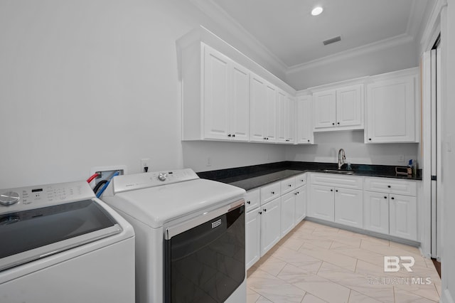 202 Paddle Creek Loop, Fairhope, AL 36532 - washroom with washer and dryer, cabinet space, ornamental molding, light marble finish flooring, and recessed lighting