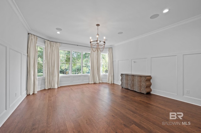 202 Paddle Creek Loop, Fairhope, AL 36532 - unfurnished living room with a decorative wall, a chandelier, ornamental molding, wood finished floors, and recessed lighting