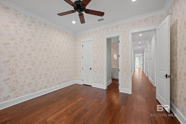 202 Paddle Creek Loop, Fairhope, AL 36532 - unfurnished bedroom with crown molding, dark wood-style flooring, wallpapered walls, recessed lighting, and baseboards
