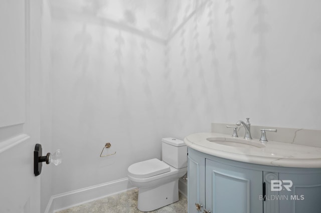 202 Paddle Creek Loop, Fairhope, AL 36532 - bathroom with vanity, toilet, and baseboards