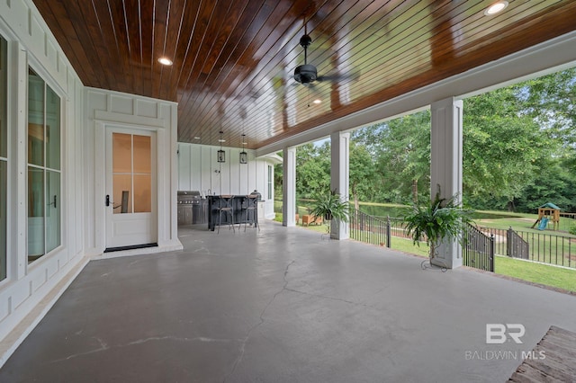 202 Paddle Creek Loop, Fairhope, AL 36532 - view of patio / terrace featuring a playground and a ceiling fan