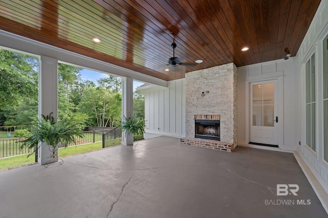 202 Paddle Creek Loop, Fairhope, AL 36532 - view of patio featuring a fireplace and a ceiling fan