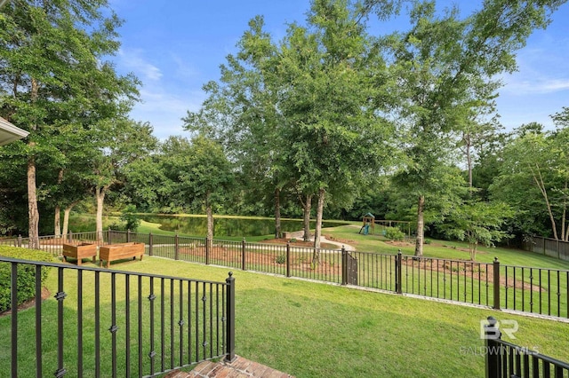202 Paddle Creek Loop, Fairhope, AL 36532 - view of yard featuring view of wooded area and a playground