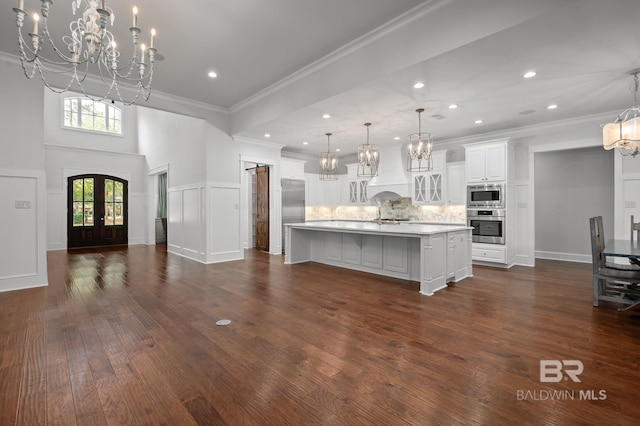 202 Paddle Creek Loop, Fairhope, AL 36532 - kitchen featuring a chandelier, stainless steel appliances, recessed lighting, light countertops, and backsplash