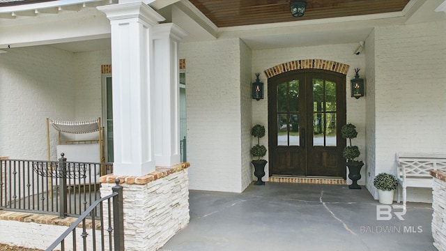 202 Paddle Creek Loop, Fairhope, AL 36532 - doorway to property featuring french doors and brick siding