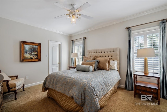 carpeted bedroom featuring multiple windows, crown molding, and ceiling fan