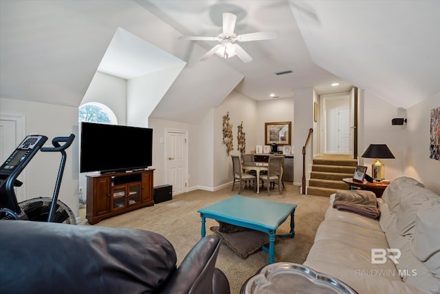 carpeted living room with lofted ceiling and ceiling fan