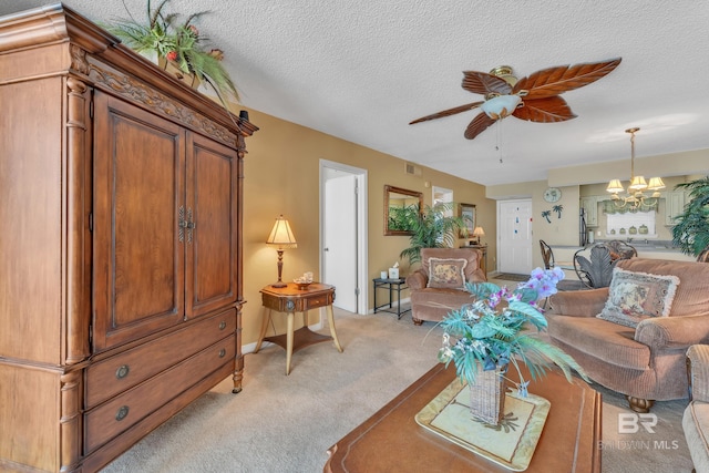24522 Perdido Beach Blvd Unit 5617, Orange Beach, AL 36561 - living area with light carpet, a chandelier, ceiling fan, and a textured ceiling