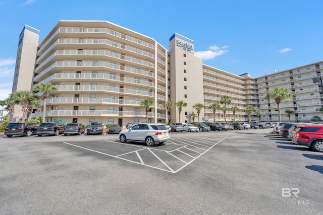 24522 Perdido Beach Blvd Unit 5617, Orange Beach, AL 36561 - view of apartment building / complex with uncovered parking