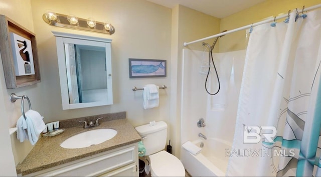 full bathroom featuring toilet, vanity, and shower / bath combo with shower curtain