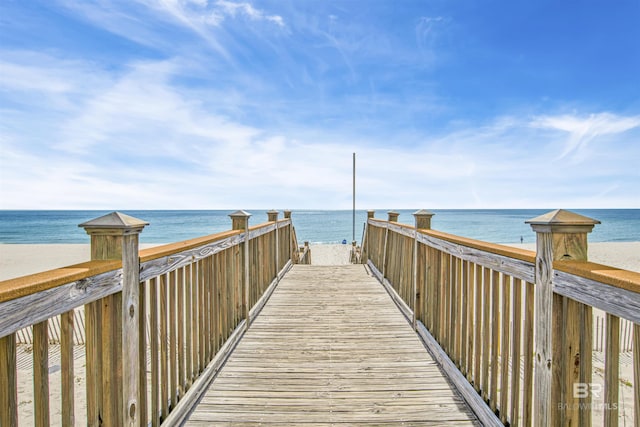 surrounding community featuring a water view