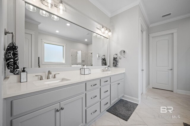 full bathroom featuring a sink, visible vents, and crown molding