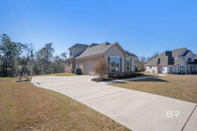 view of side of property with brick siding, concrete driveway, a lawn, board and batten siding, and a garage