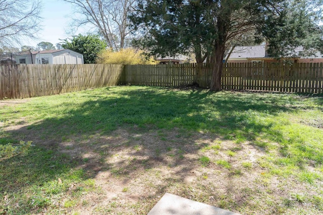 view of yard featuring a fenced backyard