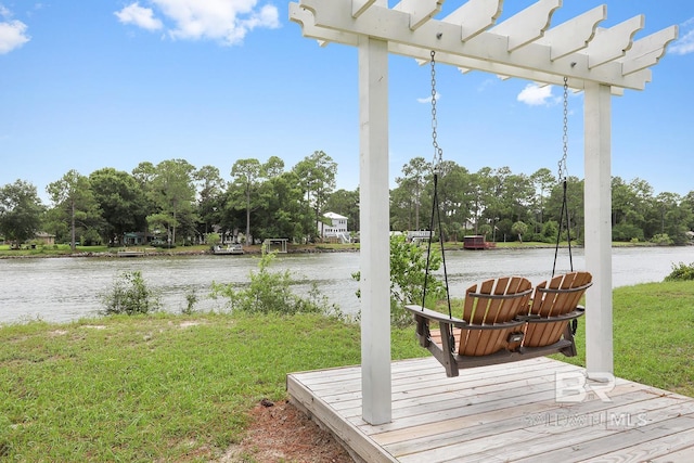 wooden deck featuring a pergola, a water view, and a yard