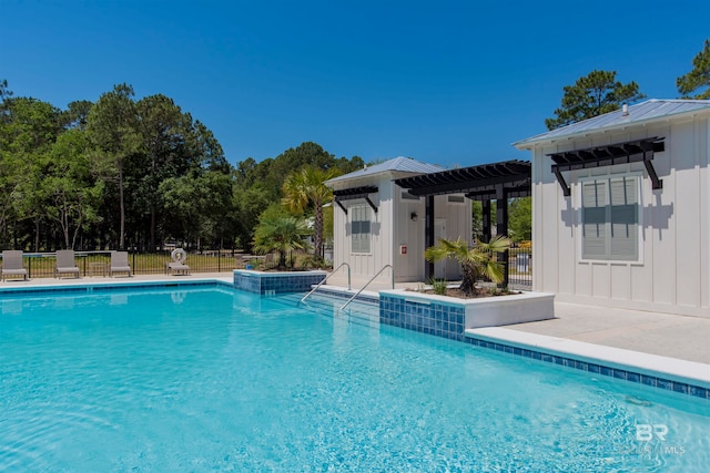 view of swimming pool featuring a patio