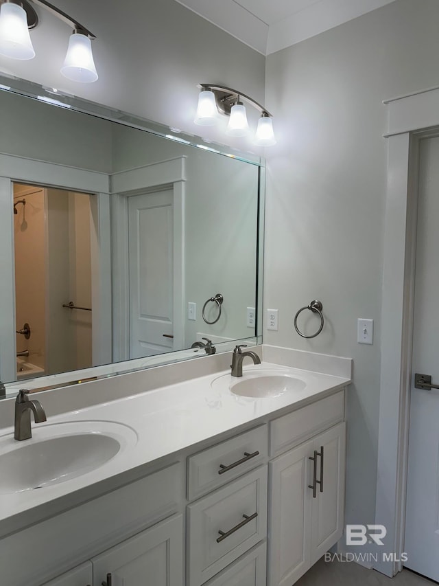 bathroom featuring double vanity