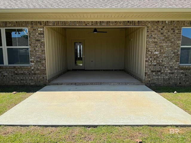 property entrance featuring a patio and ceiling fan