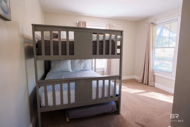 bedroom featuring carpet