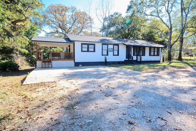 ranch-style house featuring a porch